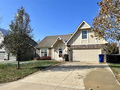 Features a contemporary layout with a spacious living area, well-equipped kitchen, and private patio or yard. . Houses for rent lawrence ks